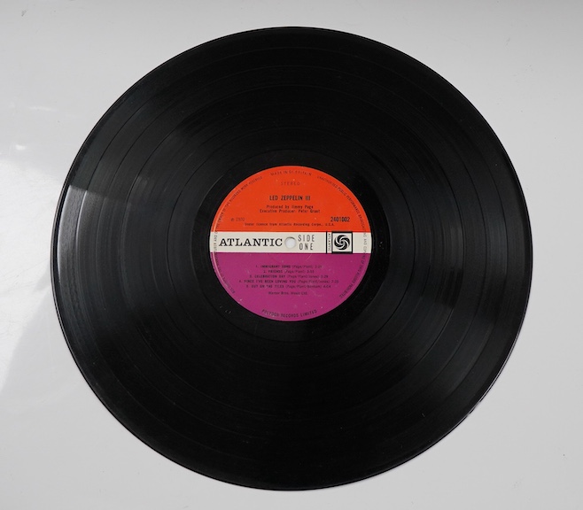 Led Zeppelin; the first three LP record albums, all on red and plum Atlantic labels; Led Zeppelin I (588171), 588171 A1 / 588171 B4, Led Zeppelin II (588198), 588198 A2 / 588198 B2, Led Zeppelin III (2401002), 2401002 A5